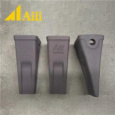 1U3252 Kované dlhé zuby